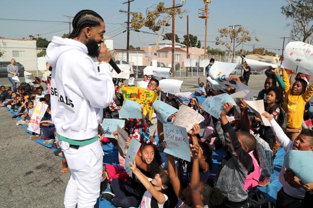 Fans Swarm Nipsey Hussle’s Marathon Clothing Store To Mourn Rapper’s Sudden Death