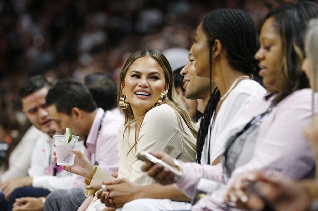 Chrissy Teigen Claps Back At Troll Who Says She Needs To “Get To The Gym”