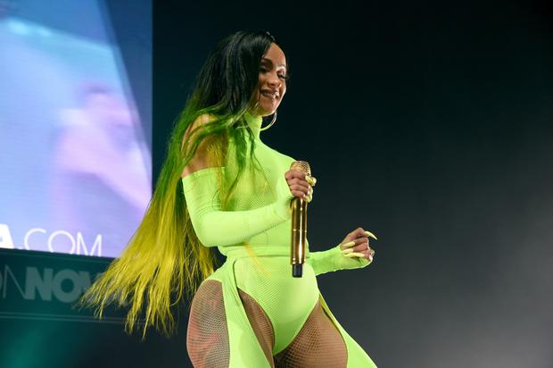 Cardi B Looks Curvy As Hell In Neon Thong Bodysuit After Revealing She Had Liposuction