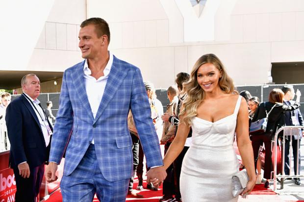 Rob Gronkowski Squats Camille Kostek At SI Swimsuit Party: Video