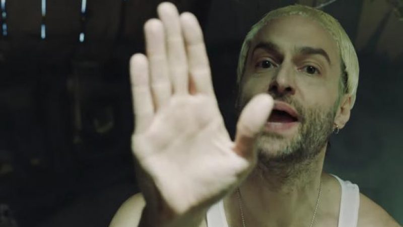 Logic, Eminem, & Chris D’Elia Unite For Disguise-Filled “Homicide” Video