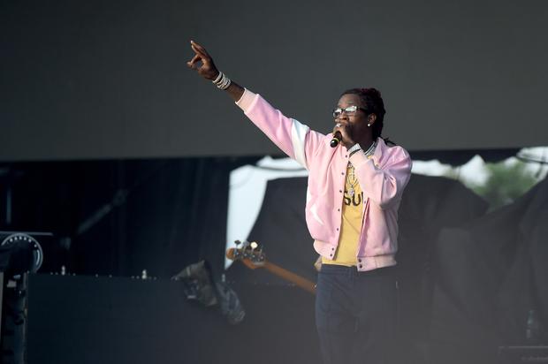 Young Thug Brings Out 14-Year-Old Sick Fan During Lollapalooza Set
